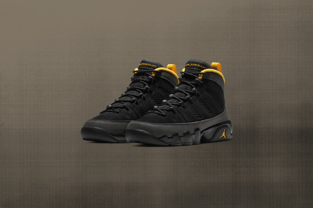 Air Jordan 9 Retro (GS) "University Gold" - Black/Dark Charcoal