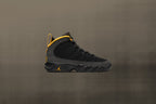 Air Jordan 9 Retro (GS) "University Gold" - Black/Dark Charcoal