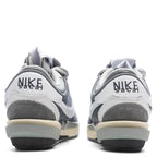 Nike x Sacai Zoom Cortez 4.0 - Iron Grey/White/Light Cream